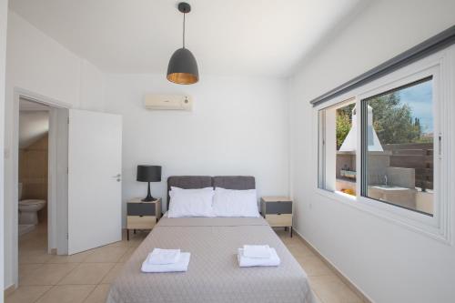 Ένα ή περισσότερα κρεβάτια σε δωμάτιο στο Elite Luxury Villa