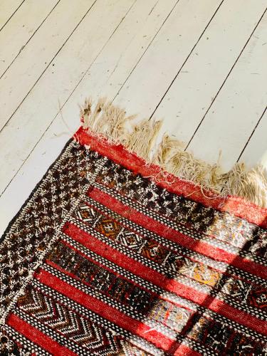 a rug on the floor on a wooden floor at SLEEP INN - 1001 Nights Loft Citycenter with Balconyview in Antwerp