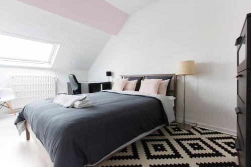 Ένα ή περισσότερα κρεβάτια σε δωμάτιο στο Cocoon - Duplex 3 chambres 140 m2