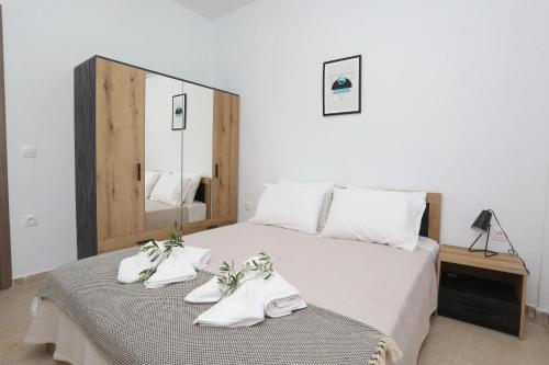 Postel nebo postele na pokoji v ubytování Mare Monte Luxury Apartments 2