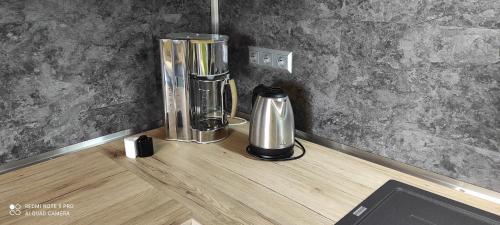 a blender sitting on a counter in a kitchen at Ferienhaus im Ederbergland in Hatzfeld