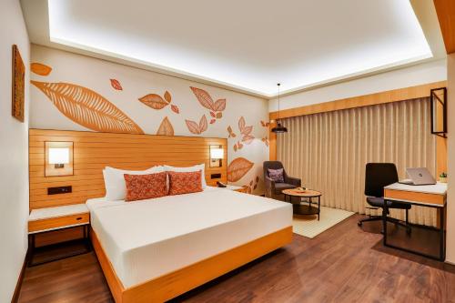 מיטה או מיטות בחדר ב-Lemon Tree Premier, Vijayawada