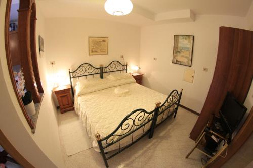Postel nebo postele na pokoji v ubytování Apartments Butinar Pri Kapitanu