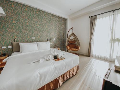 禾旅宿Ho Hostel 墾丁夢幻島にあるベッド