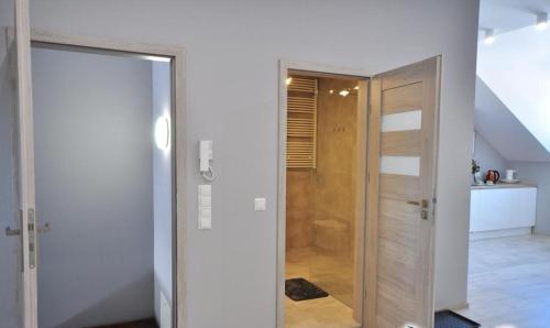 O baie la Apartament nad Kamienną