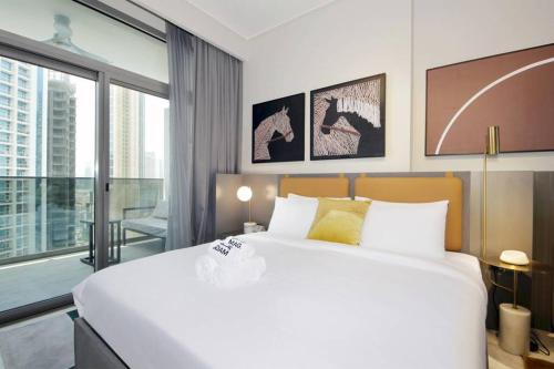 Postel nebo postele na pokoji v ubytování New Arabian MAG 318 Business Bay
