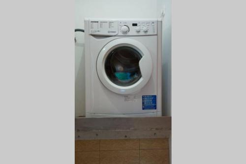 a white washing machine in a room at Pulchra Campis,Private Pool,Wifi,Parking in Nerokoúros