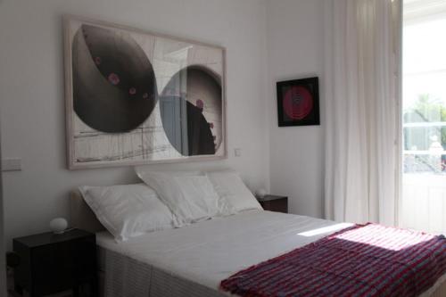 Katil atau katil-katil dalam bilik di Tavira Home