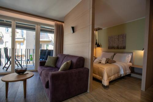 Posteľ alebo postele v izbe v ubytovaní Residence Villa Hedy