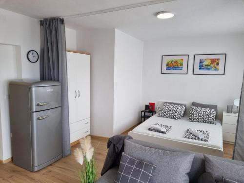 Kuchyňa alebo kuchynka v ubytovaní Apartmani Mali