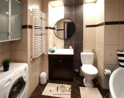 Kúpeľňa v ubytovaní Apartament Peowiaków Superior