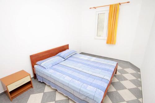 Ένα ή περισσότερα κρεβάτια σε δωμάτιο στο Seaside secluded apartments Cove Jedra, Hvar - 2583