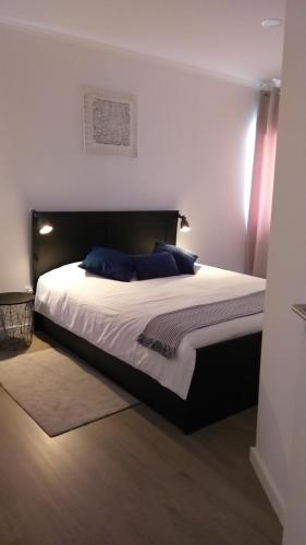 Кровать или кровати в номере Historic Center Beach Apartment - Lagos - Algarve