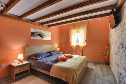 Un pat sau paturi într-o cameră la Villa Anima