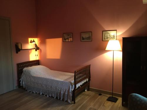 Llit o llits en una habitació de Corte San Giuliano