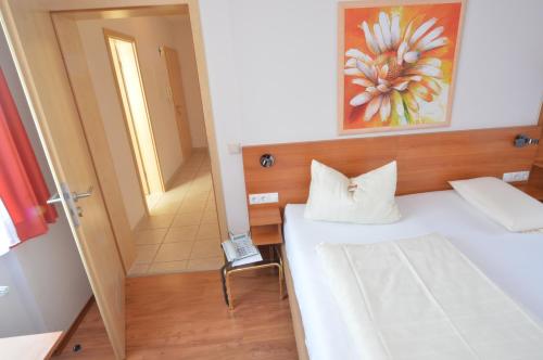 Postel nebo postele na pokoji v ubytování Aktivhotel Alter Kaiser