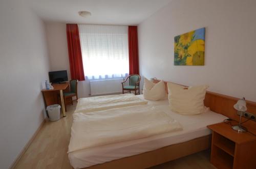 Postel nebo postele na pokoji v ubytování Aktivhotel Alter Kaiser