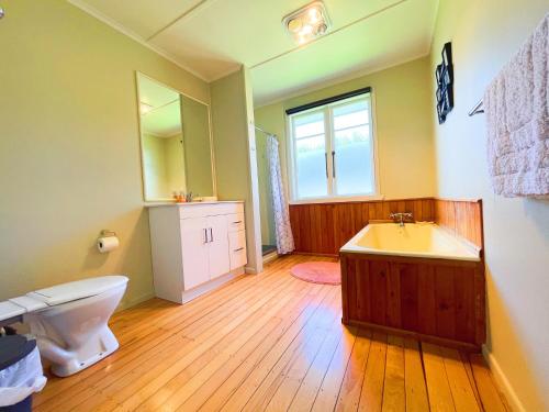 A bathroom at Cosy family home with a sunny deck