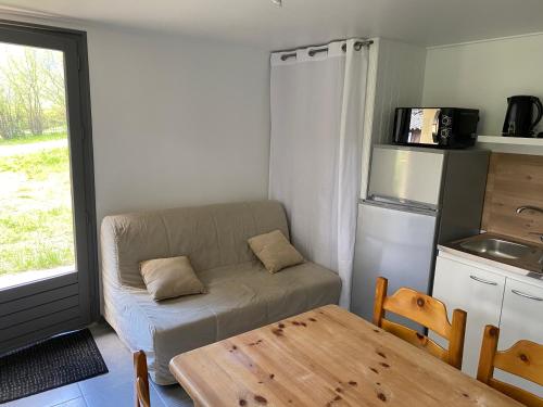 Kuchyň nebo kuchyňský kout v ubytování Appartement dans Le Chalet