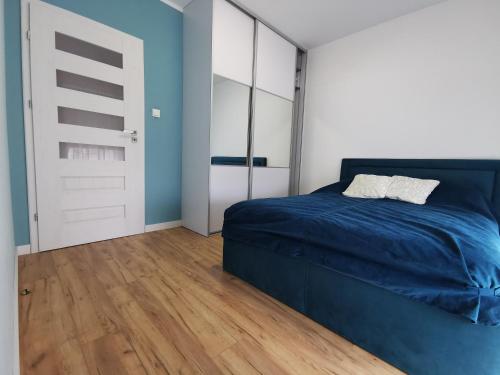 Posteľ alebo postele v izbe v ubytovaní Apartamemt Królowej Jadwigi