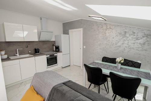 Kuchyň nebo kuchyňský kout v ubytování Apartman Marta