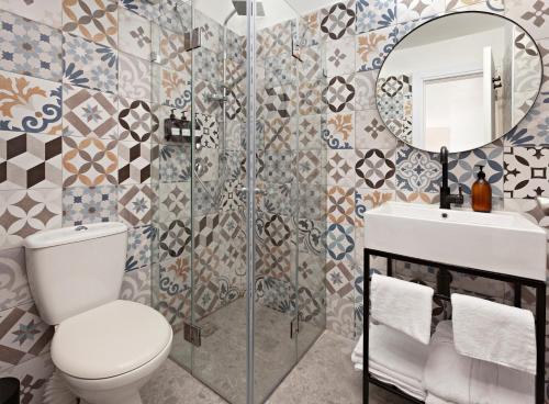 Ванна кімната в De Cardo Hotel