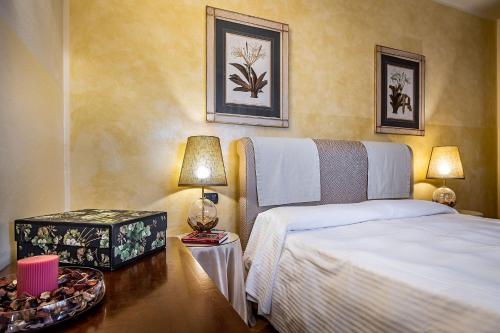 Katil atau katil-katil dalam bilik di Palazzo Gamba Apartments al Duomo