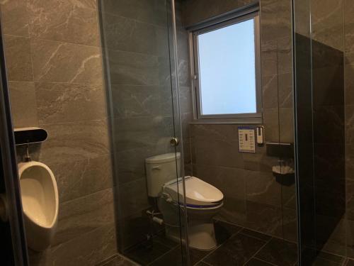 Salle de bains dans l'établissement 有間寓背包旅宿