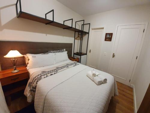 Cama ou camas em um quarto em Pousada Orquidea da Serra