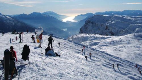 a group of people on top of a snow covered mountain at Hotel Olisamir in Cavedago