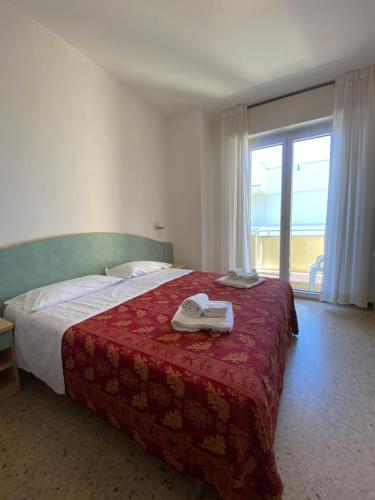 Postel nebo postele na pokoji v ubytování Hotel Artide