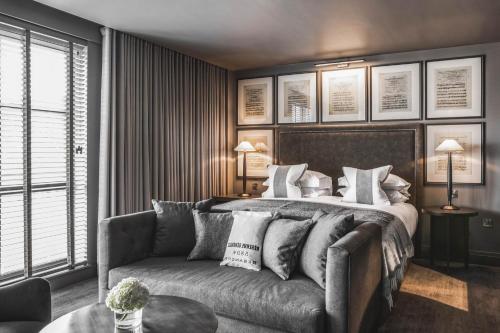 A bed or beds in a room at Dakota Glasgow 