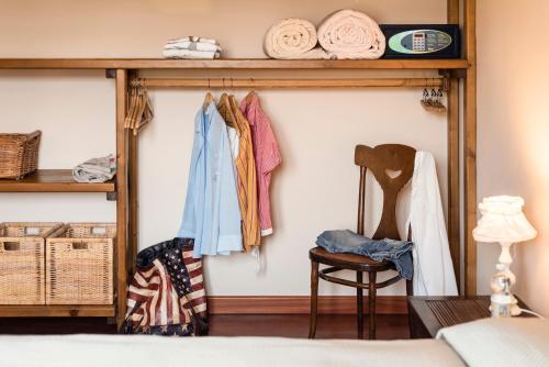 a room with a closet with clothes at Residenza Santa Cecilia in San Vincenzo