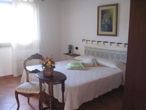 Cama o camas de una habitación en Tenuta Don Ballore Country Resort