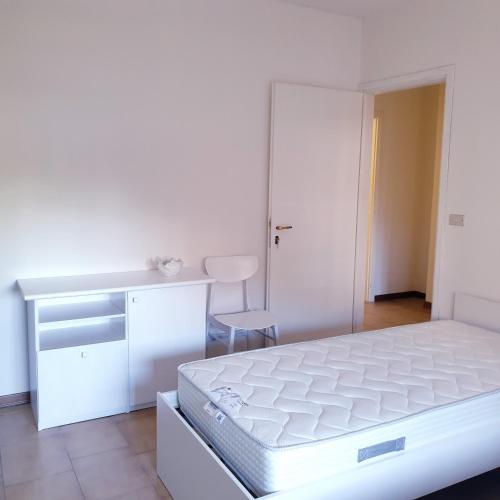 Postel nebo postele na pokoji v ubytování Hotel Paradiso Dépendance