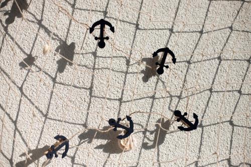 a group of people walking on a street at Captain's Suite in Neusiedl am See