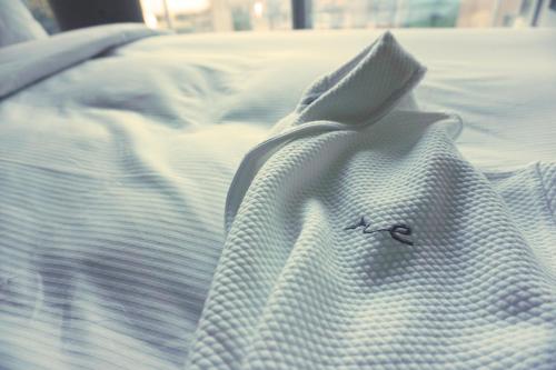 a bed with a bedsheet with a spider on it at reStays Ottawa in Ottawa