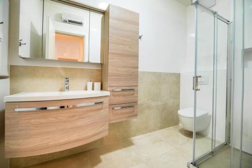 Kúpeľňa v ubytovaní Sea view apartment Ema