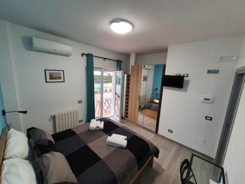 Postel nebo postele na pokoji v ubytování @home Napoli