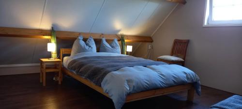 Een bed of bedden in een kamer bij Beachloft Zeeland 1