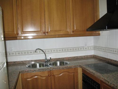 Kuchyň nebo kuchyňský kout v ubytování Benicarlo 4A2 Apartamento con amplia terraza y vistas al mar, WIFI, garaje
