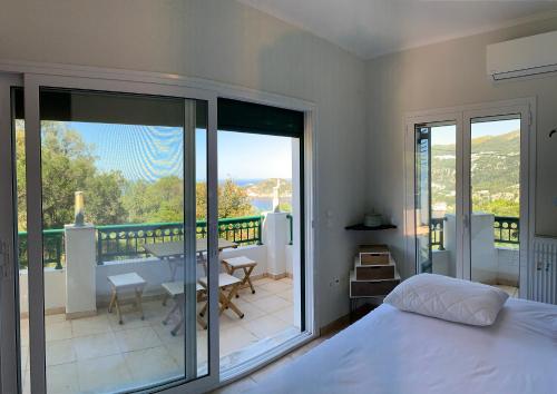 Postel nebo postele na pokoji v ubytování Villa Pyrgos