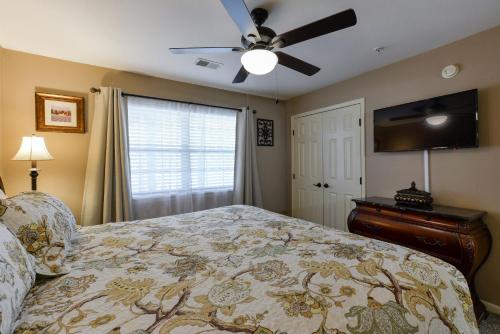 a bedroom with a bed and a ceiling fan at Luxury Condos at Thousand Hills - Heart of Branson - Beautifully remodeled - Spacious and Affordable in Branson