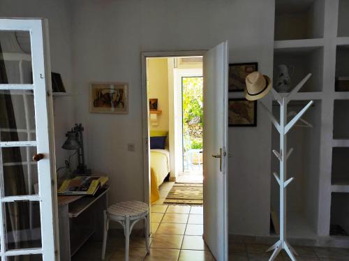 a hallway with a door open to a room at Getaway house Gundula in Podstražje