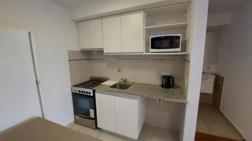 1 dormitorio - zona Pichincha - Nuevo tesisinde mutfak veya mini mutfak