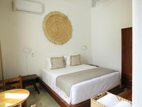 מיטה או מיטות בחדר ב-Casa Cora
