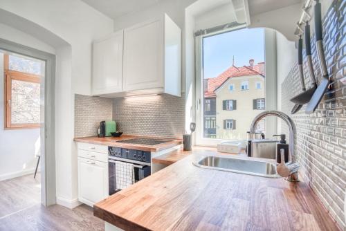 Foto InnsbruckHomes at Botanical Garden 6