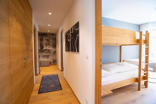 Katil dua tingkat atau katil-katil dua tingkat dalam bilik di Residenz Hofer