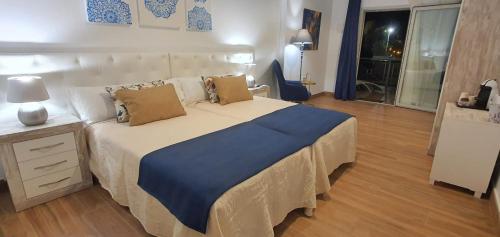 Postel nebo postele na pokoji v ubytování Sandra Rooms
