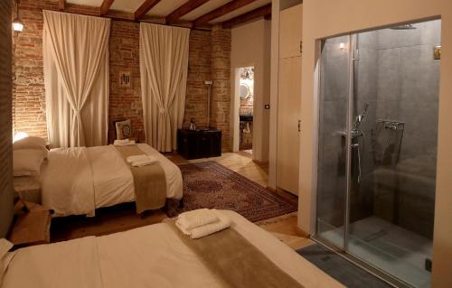 A bed or beds in a room at Le Petit Secret, Korce, Albania